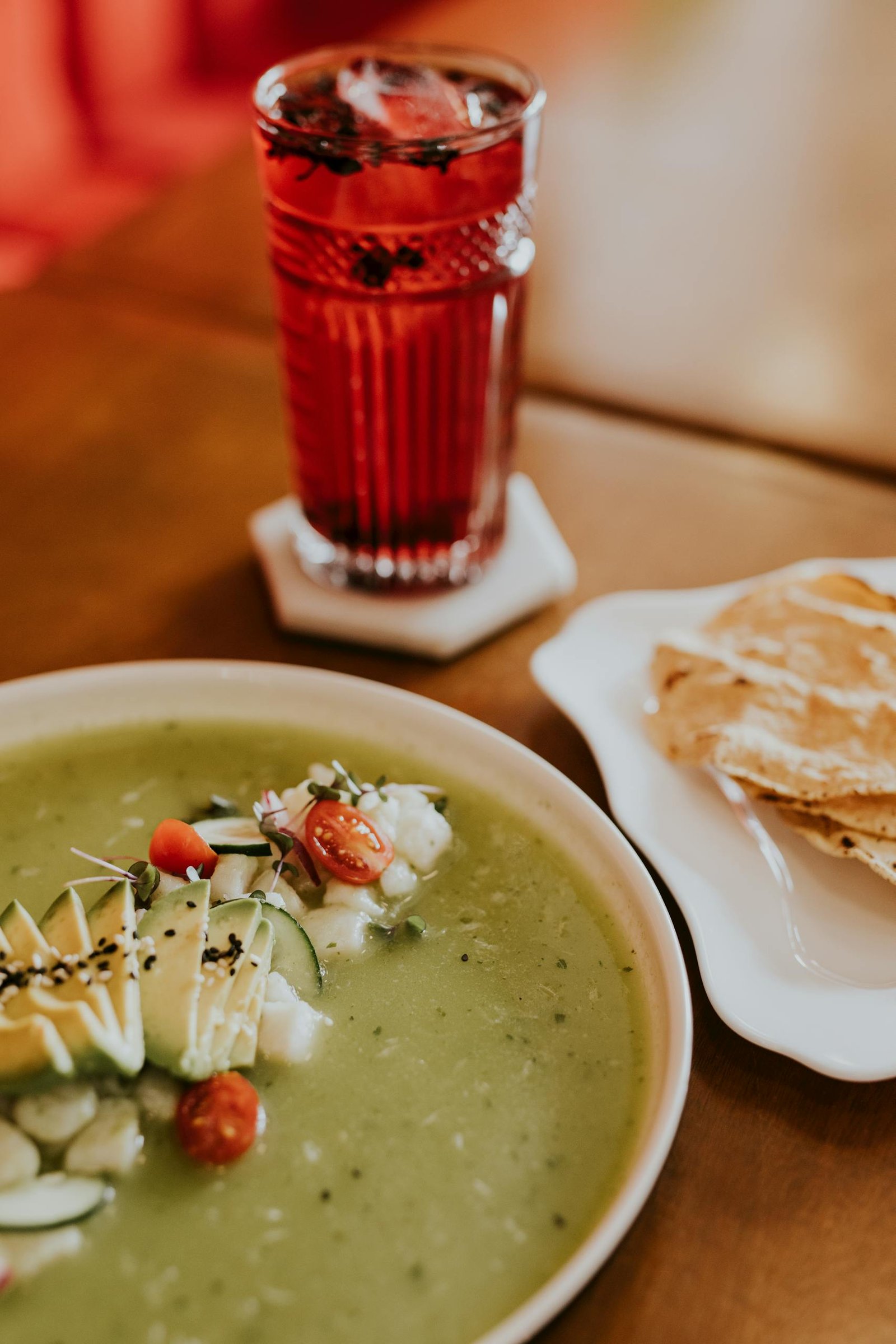 Spain Travel Guide: Things to know before travelling to Spain 14 Appetizing green gazpacho served with avocado, cherry tomatoes and a refreshing tomato-based drink.