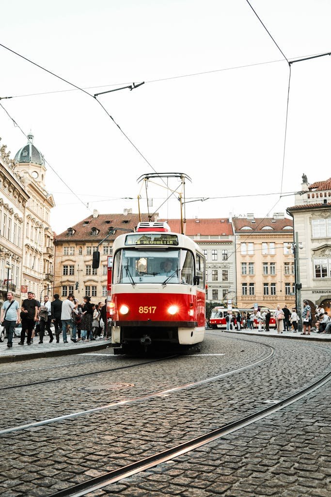 3 Magical Days in Prague (My Prague travel Itinerary) 13 Capture of a nostalgic tram in Prague's historic city center, showcasing Czech architecture.