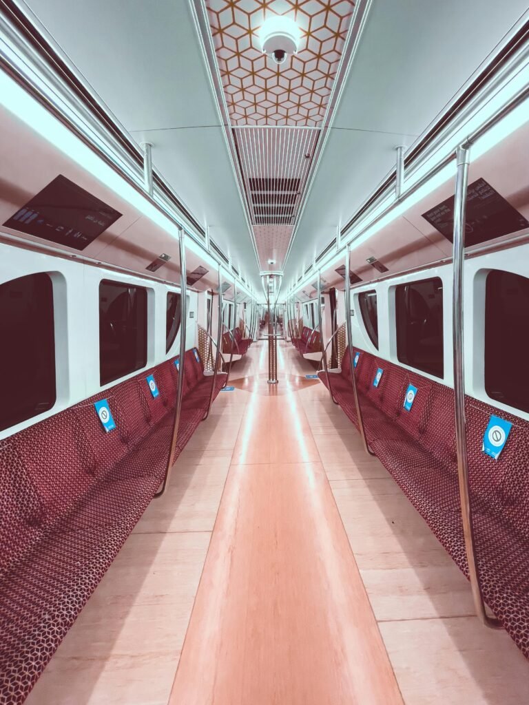 Red and white train interior of newly launched trains in Qatar 