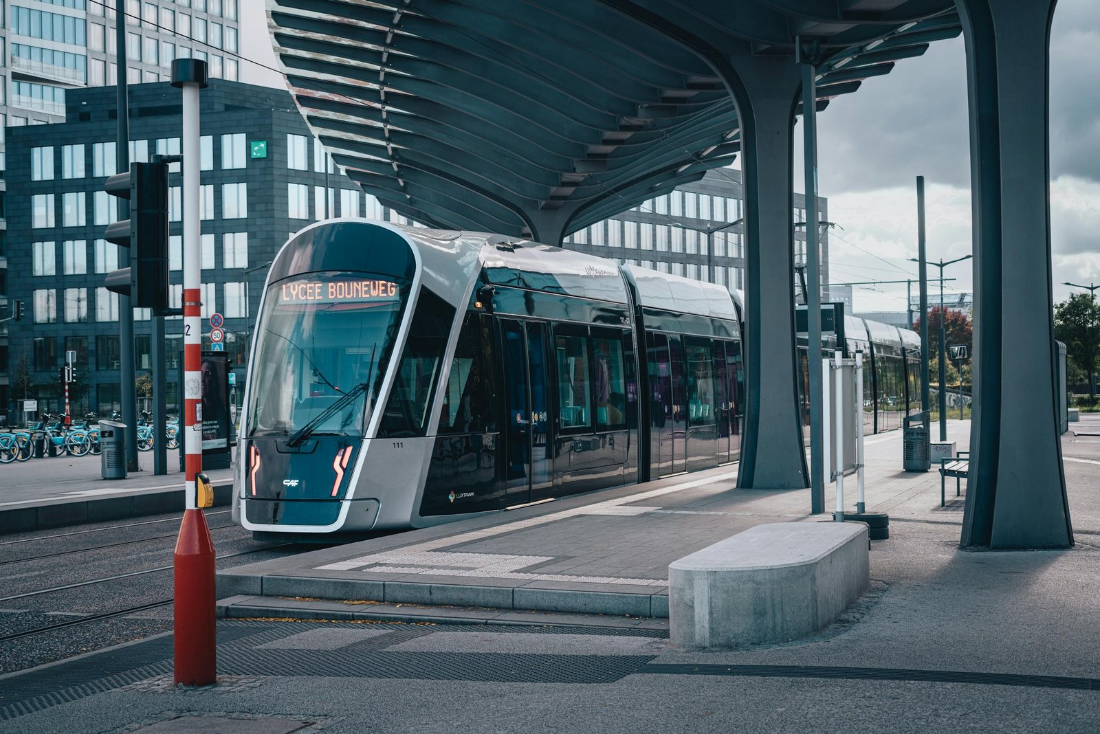 A sleek tram in Luxembourg City station showcasing urban public transportation.
