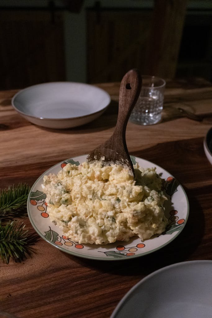 Delicious Slovak potato salad served in a festive setting, perfect for Christmas gatherings.