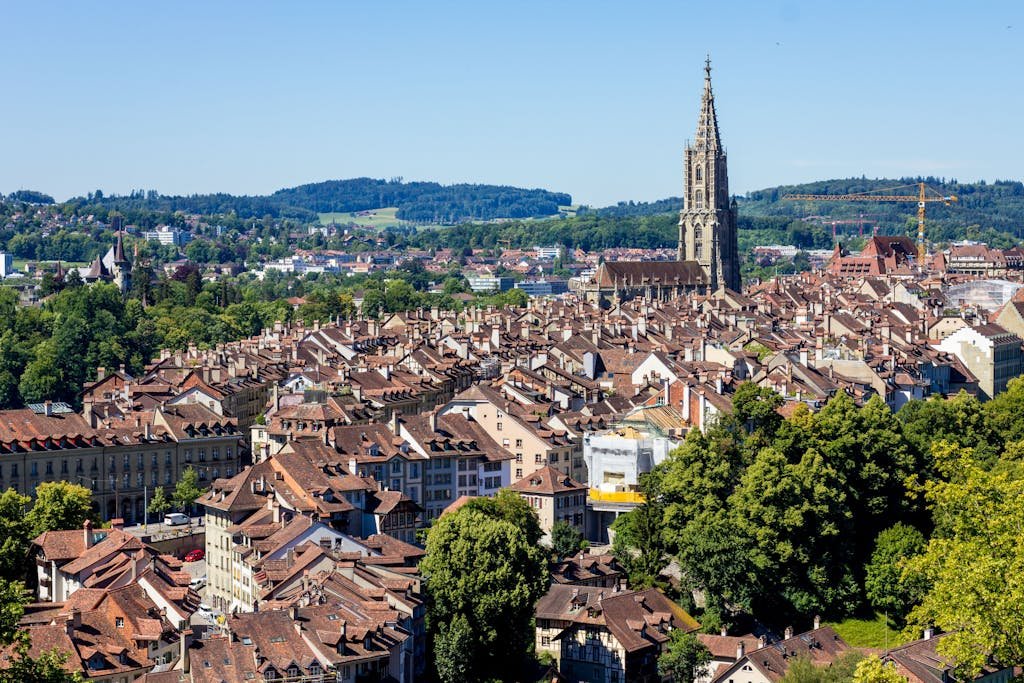 How to Spend the Perfect 5 Days in Switzerland Itinerary? 17 A picturesque view of Bern's skyline featuring the Bern Minster, showcasing historical architecture.