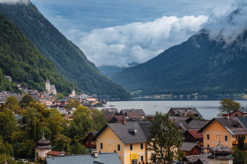5 Days in Austria: The Perfect Austria Road Trip Itinerary 3 A scenic view of Hallstatt, Austria, with lush mountains and serene lake.