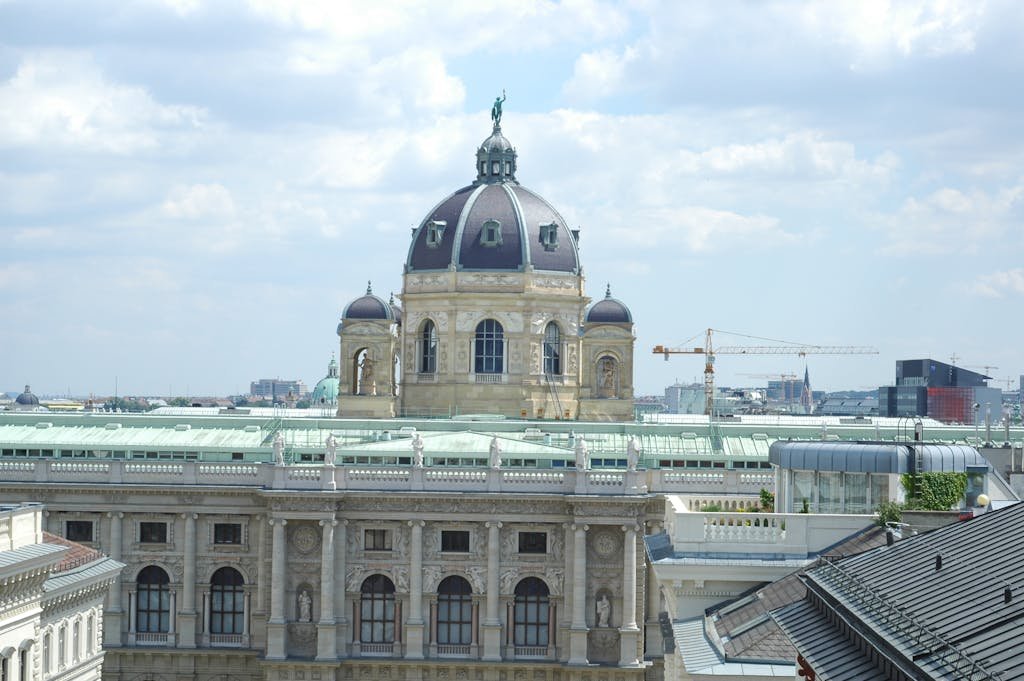 5 Days in Austria: The Perfect Austria Road Trip Itinerary 6 A stunning aerial view capturing the ornate dome of the Natural History Museum in Vienna, Austria.