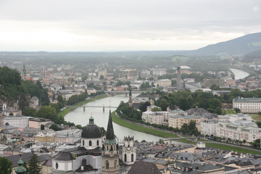 5 Days in Austria: The Perfect Austria Road Trip Itinerary 14 Aerial view of Salzburg with iconic churches and the Salzach River.