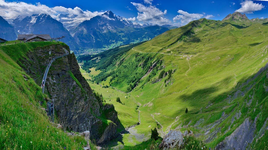 How to Spend the Perfect 5 Days in Switzerland Itinerary? 12 Experience the stunning scenery of Grindelwald, Switzerland, with majestic mountains and lush valleys.