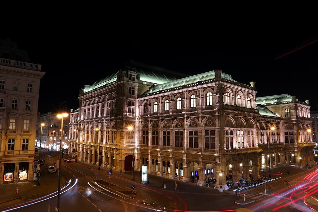 5 Days in Austria: The Perfect Austria Road Trip Itinerary 5 Illuminated Vienna State Opera at night, showcasing famous architectural grandeur in Austria.
