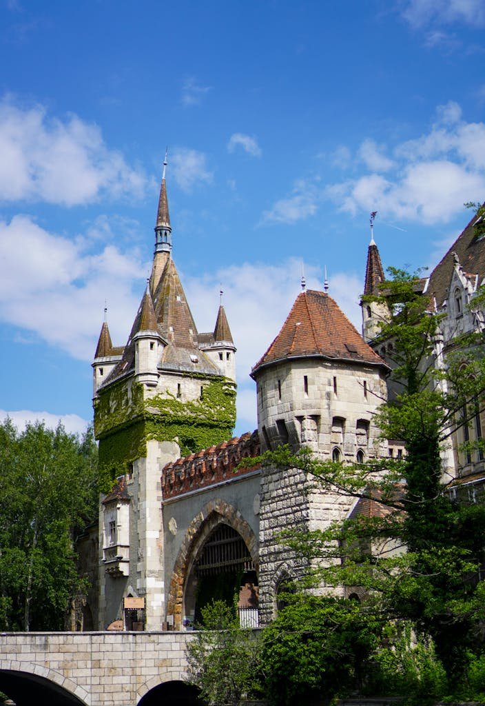 20 Best Things to Do in Budapest, Hungary: An In-depth Travel Guide 11 Stunning view of Vajdahunyad Castle in Budapest, showcasing Gothic architecture amidst lush greenery.
