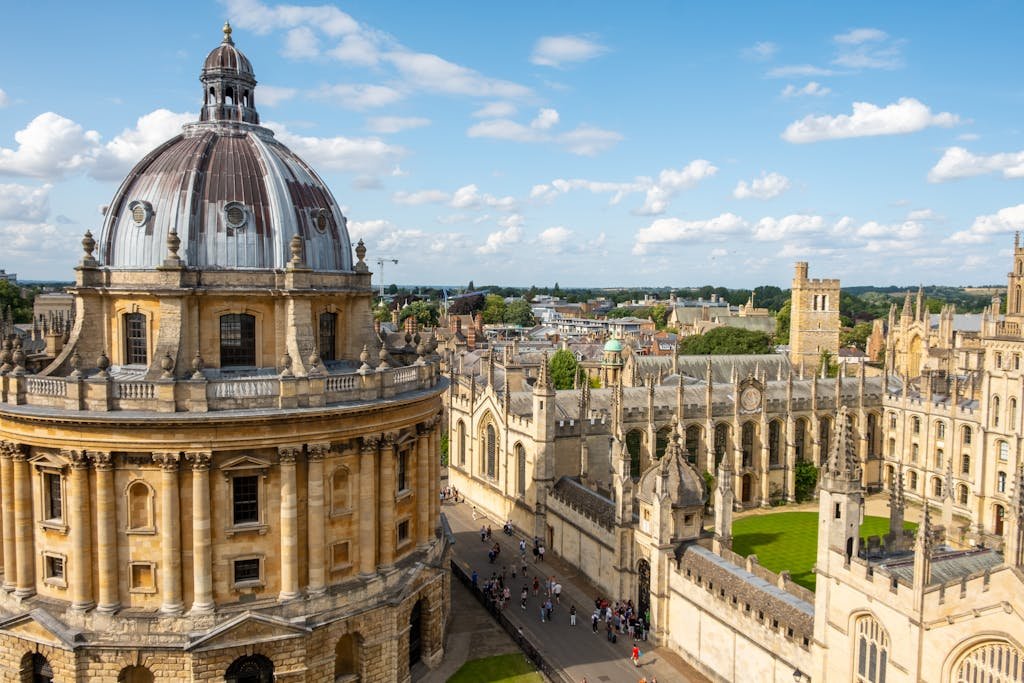 A beautiful aerial view of Oxford University's classic architecture on a bright day.