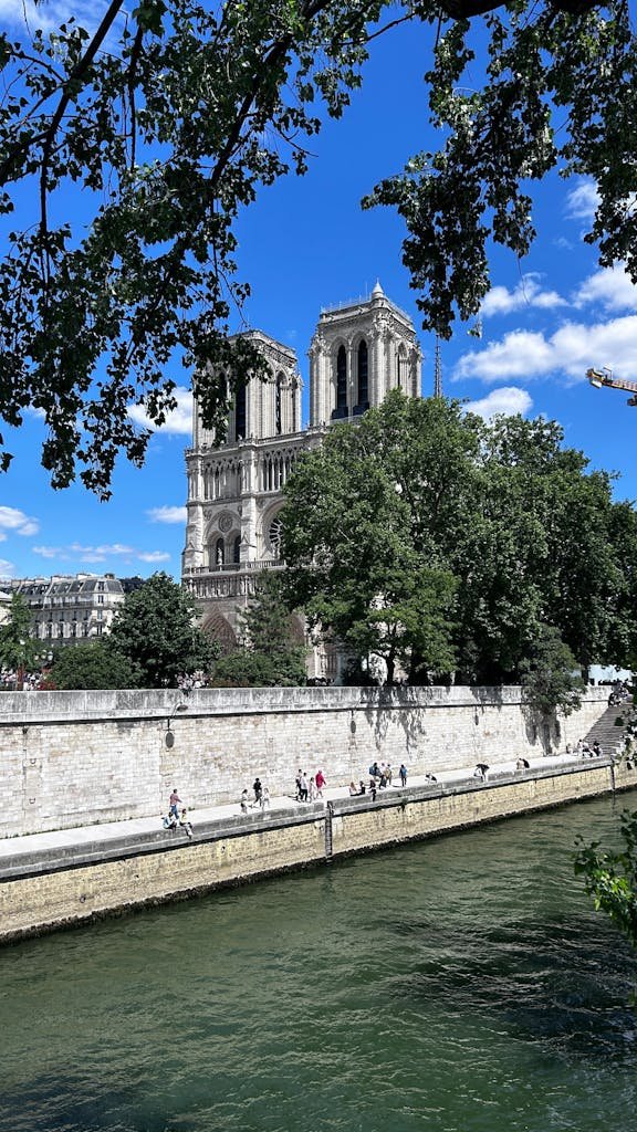 41 best Things to Do in Paris: Iconic Sights to Hidden Gems 9 Capture of the iconic Notre-Dame Cathedral by the Seine River, Paris.
