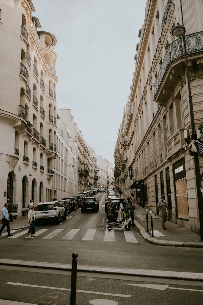 41 best Things to Do in Paris: Iconic Sights to Hidden Gems 17 Charming view of a historic street in downtown Paris, showcasing European architecture and vibrant urban life.