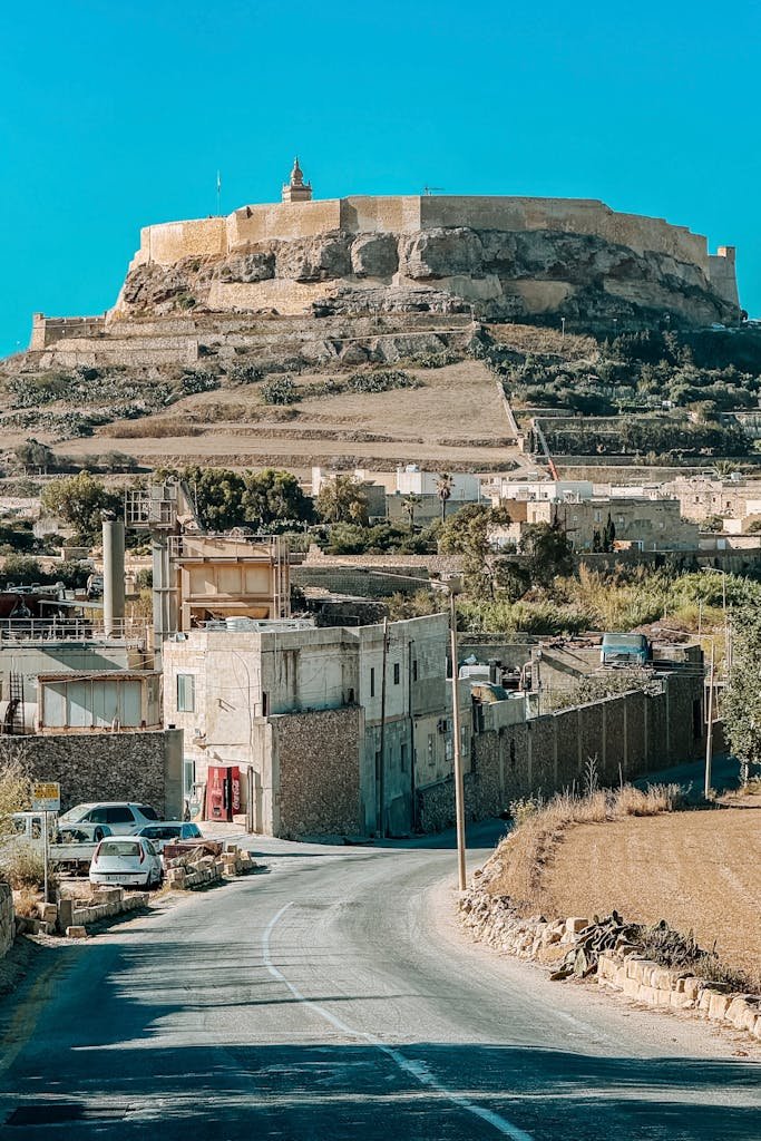 21 Best things to do in Mdina, Malta's Silent City 7 Scenic view of the Citadella fortress in Victoria, Gozo, Malta, under a clear blue sky.
