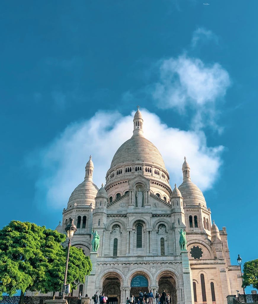 41 best Things to Do in Paris: Iconic Sights to Hidden Gems 14 Stunning view of Sacré-Cœur Basilica in Paris on a clear day.