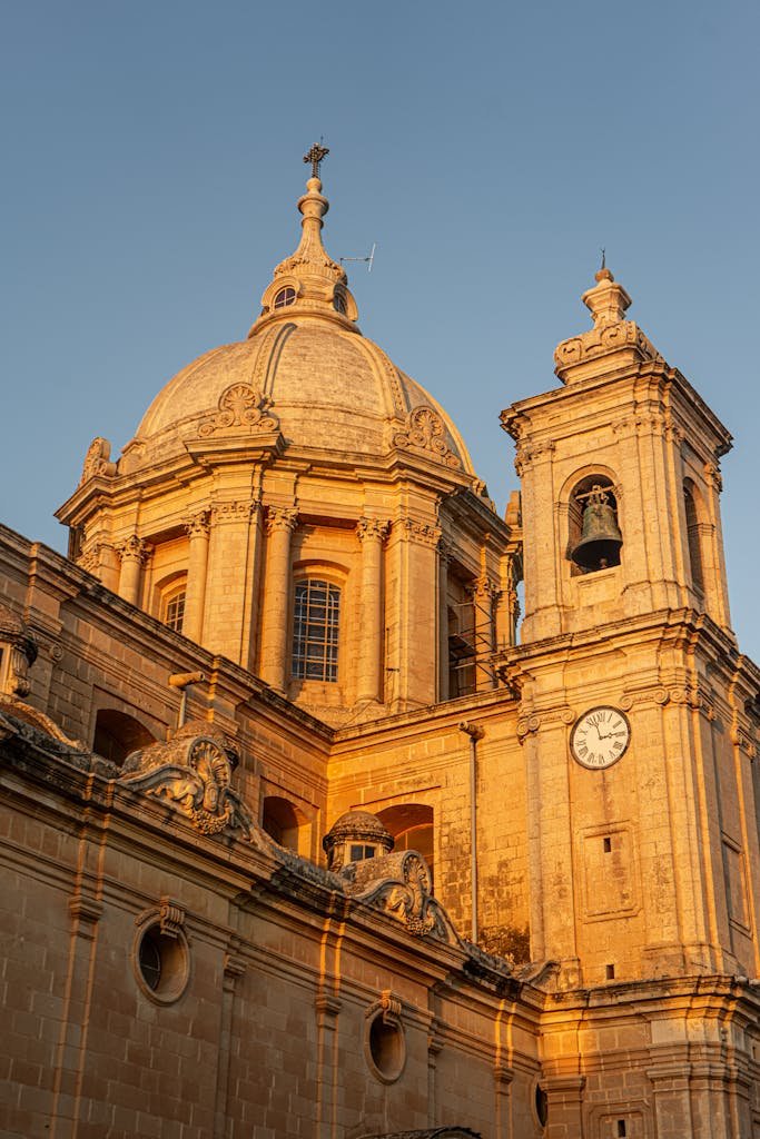 21 Best things to do in Mdina, Malta's Silent City 4 Stunning view of St. Paul's Cathedral in Mdina, Malta at golden hour.