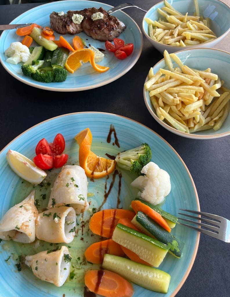 21 Best things to do in Mdina, Malta's Silent City 16 Tantalizing Mediterranean dinner with seafood, steak, fries, and vegetables served in a cozy location.