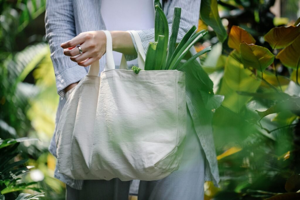 A woman holding tote bag