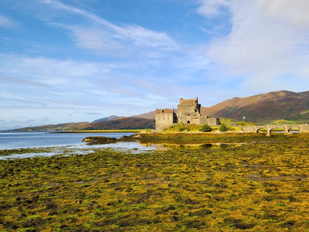 Eilean Donan Castle stands majestically by Loch Duich in Scotland, capturing historical elegance.