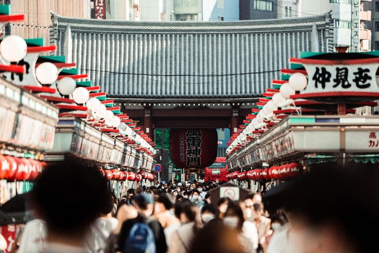 48 Simple Japanese Phrases for Tourists Visiting Japan 23 A bustling crowd in Nakamise Street, leading to Senso-ji Temple in Tokyo, Japan.