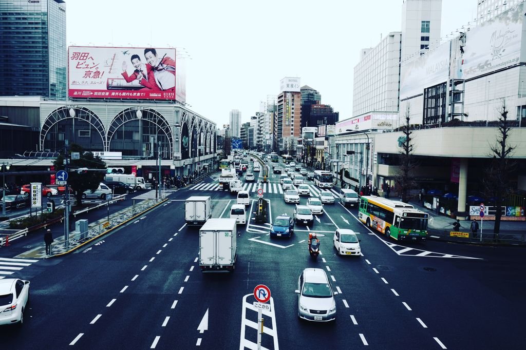 Universal Studios Japan: The Complete Guide for First-Time Visitors 4 Busy traffic scene in Shinjuku, Tokyo showcasing city life and architecture.