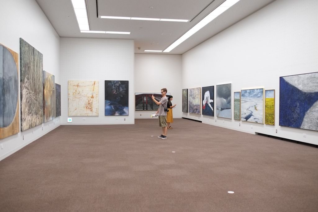 Explore captivating artworks in a Tokyo gallery exhibition.