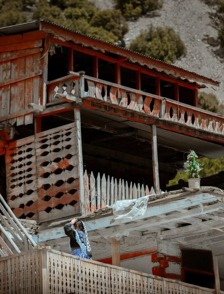 Kalash Valley Travel Guide 2026: Kalash Festivals, Culture & People 3 Traditional Kalash houses built on the hillside