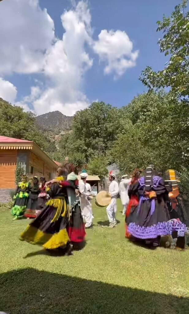 Kalash Valley Travel Guide 2026: Kalash Festivals, Culture & People 11 Traditional Kalash dance performed during a cultural festival