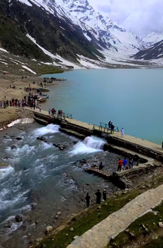 Tourists enjoying a peaceful morning at Lake Saif-ul-Malook in northern Pakistan