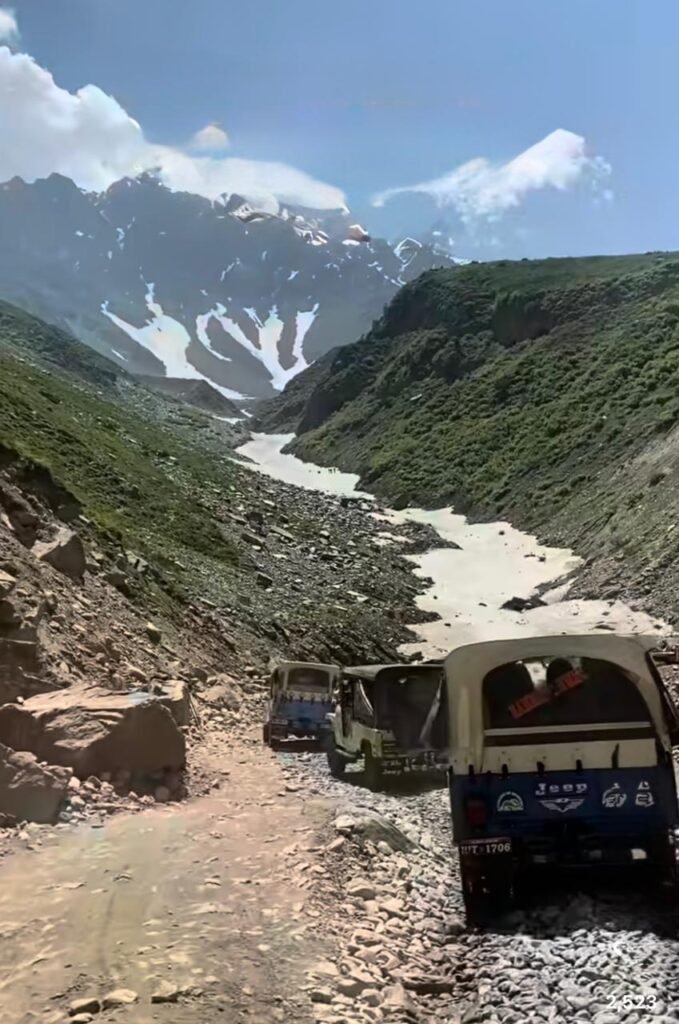 Jeep driving on the snow covered track from Naran to Lake Saif-ul-Malook