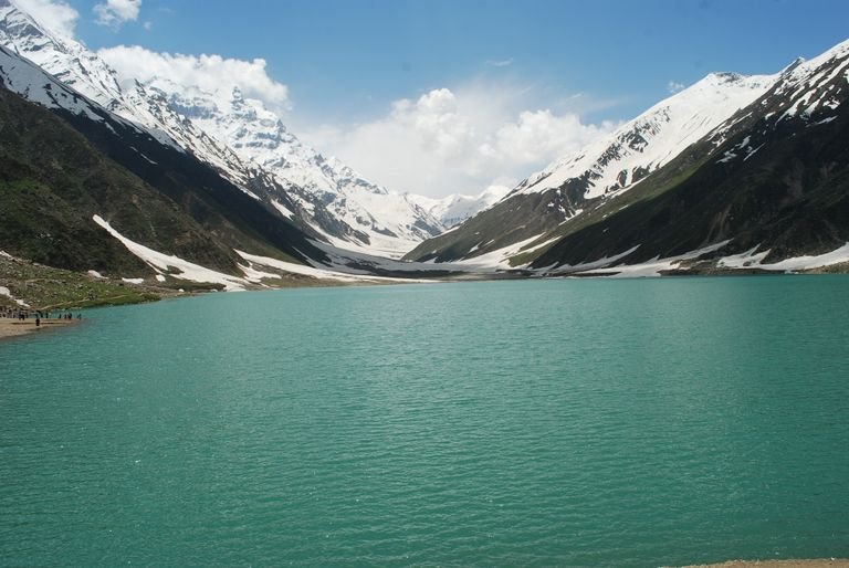 Lake Saif-ul-Malook: Why This Magical Lake Should Be on your Bucket List? 13 Beautiful Lake Saif-ul-Malook surrounded by snow-covered mountains in Khyber Pakhtunkhwa, Pakistan.