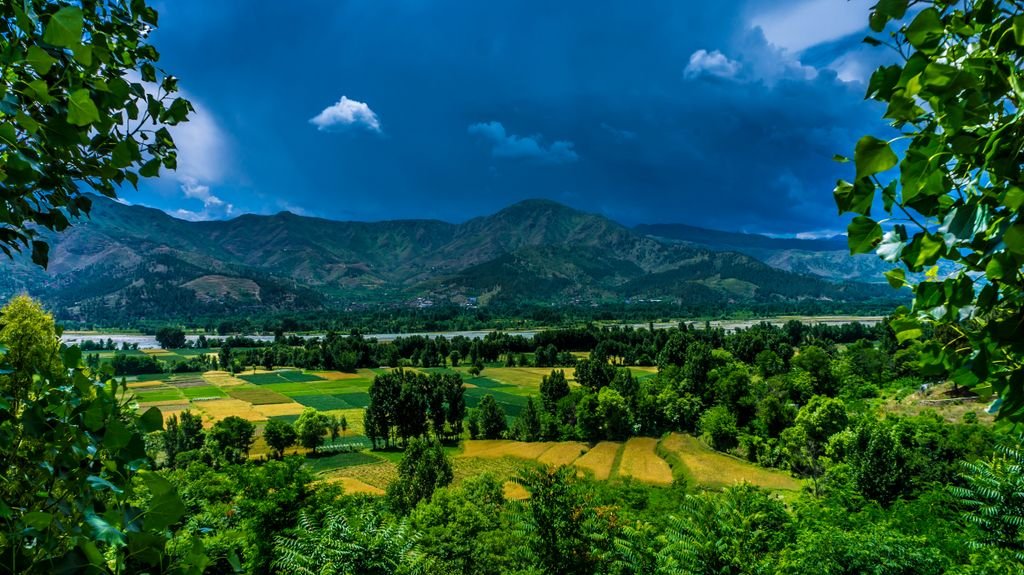 Swat Valley Travel Guide 2026: Here's Everything I Wish I Knew 3 Scenic view of Kalam Valley in Pakistan with lush greenery and mountains.