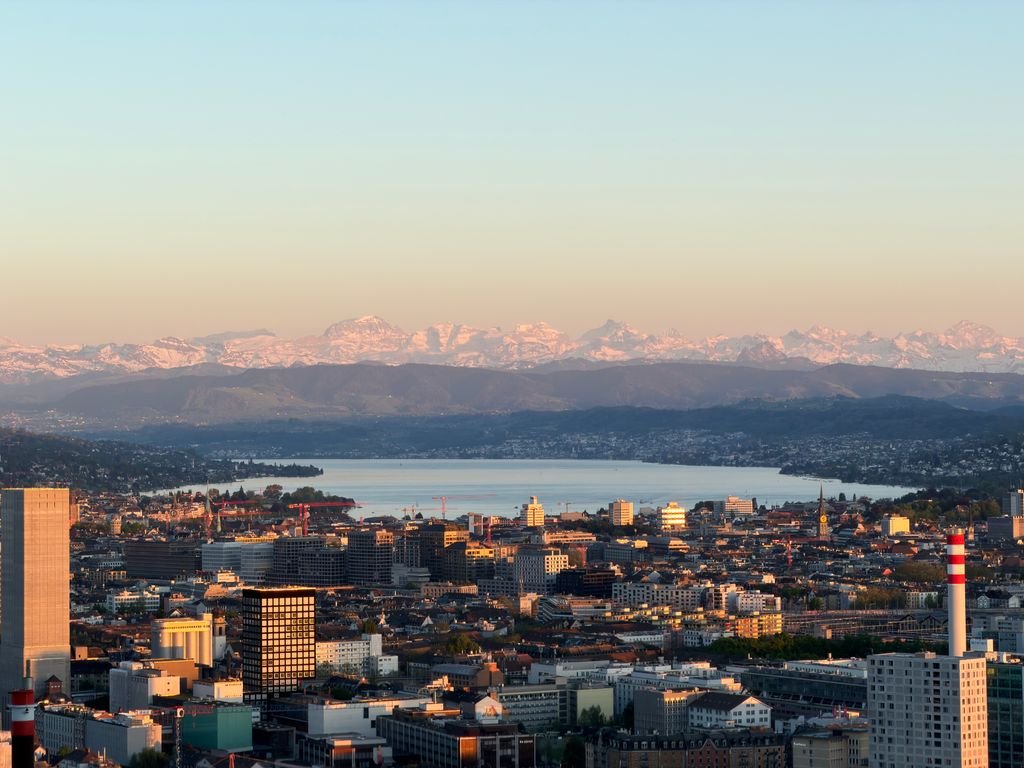 16 Amazing Things to Do in Zurich for First-Time Visitors 2 Stunning aerial view of Zürich cityscape with Lake Zürich and the Alps in the background. Things to do in Zurich